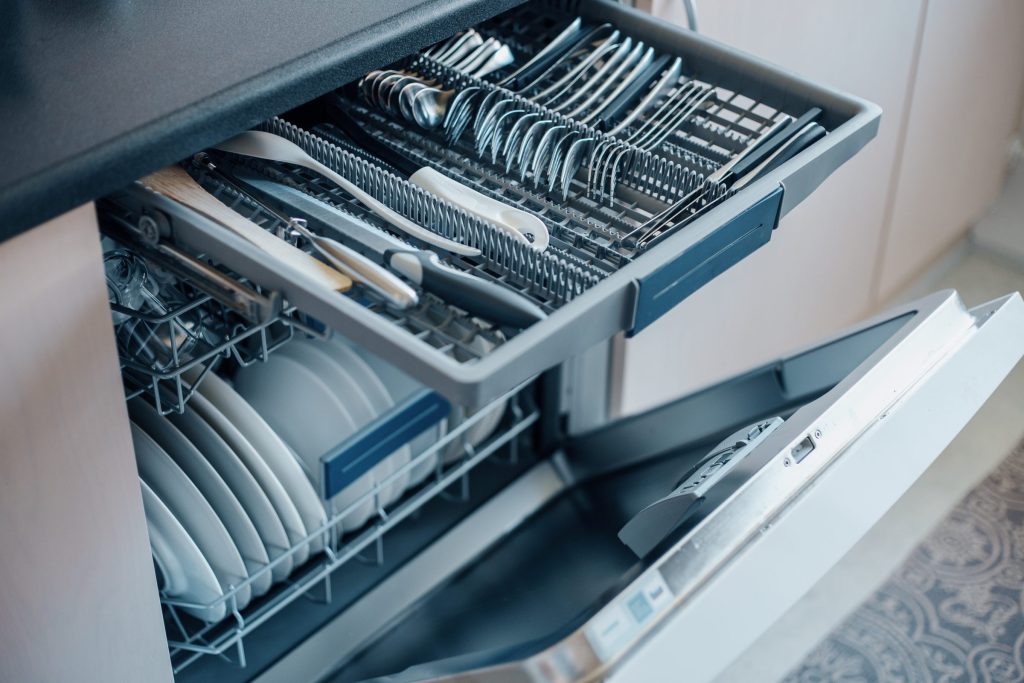 Clean dishware in a modern dishwasher.