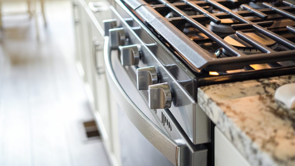 Close up of stylish kitchen cooktop appliance.