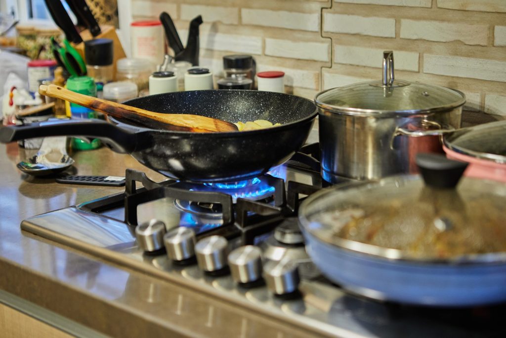 Cooking on the stove top in a home.