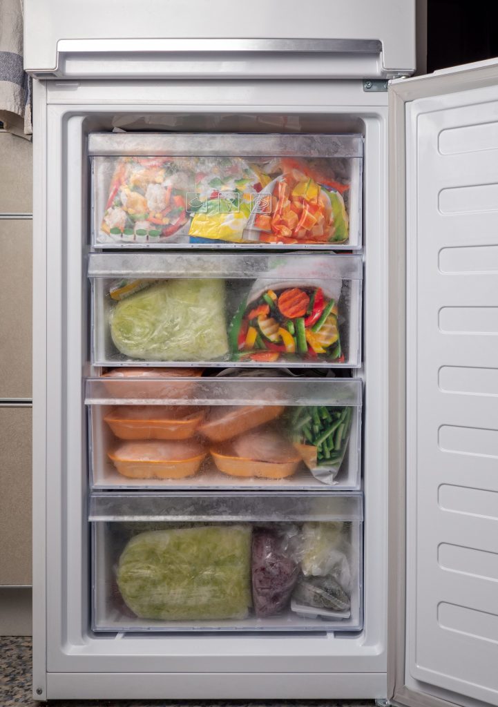 Freezer with frozen food preserved for later.