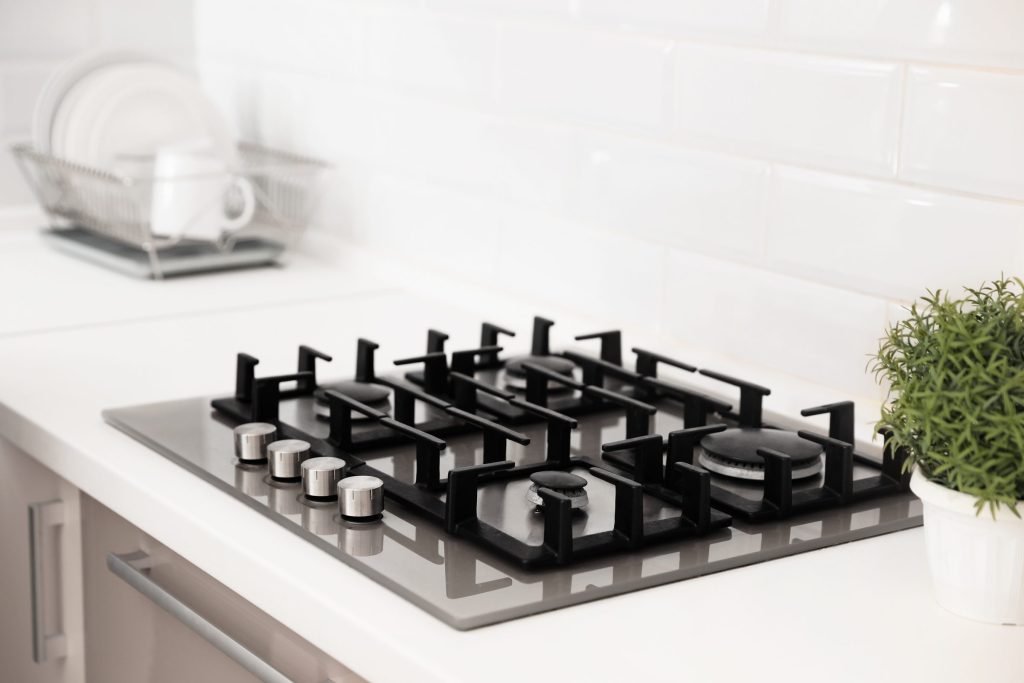 Modern kitchen design with a new gas stove.