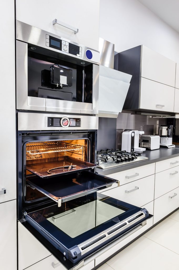 Modern kitchen interior with oven.