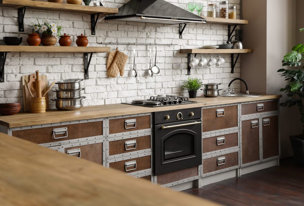An oven in a modern rustic kitchen.