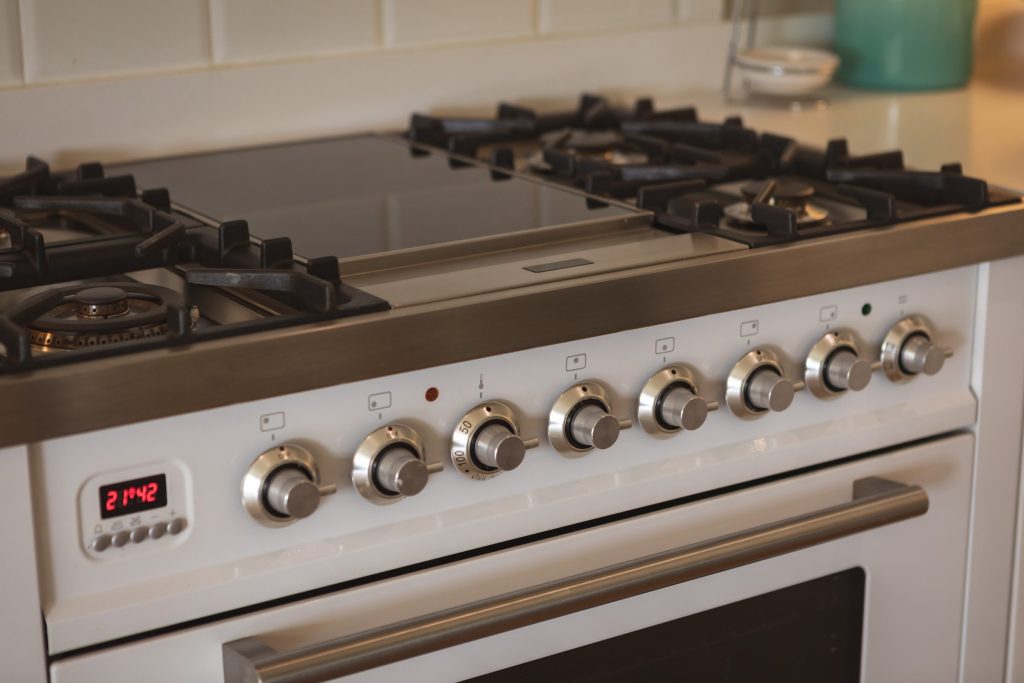 Stylish white gas range oven.