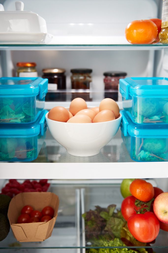 View inside refrigerator of healthy food.